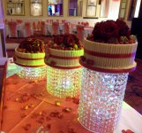 272  - chocolate cigarellos wedding cake with fresh fruit and roses.JPG